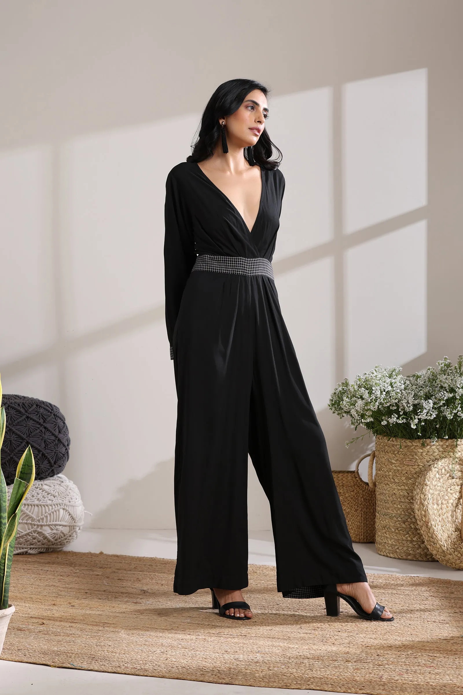 BELTED CHECK JUMPSUIT