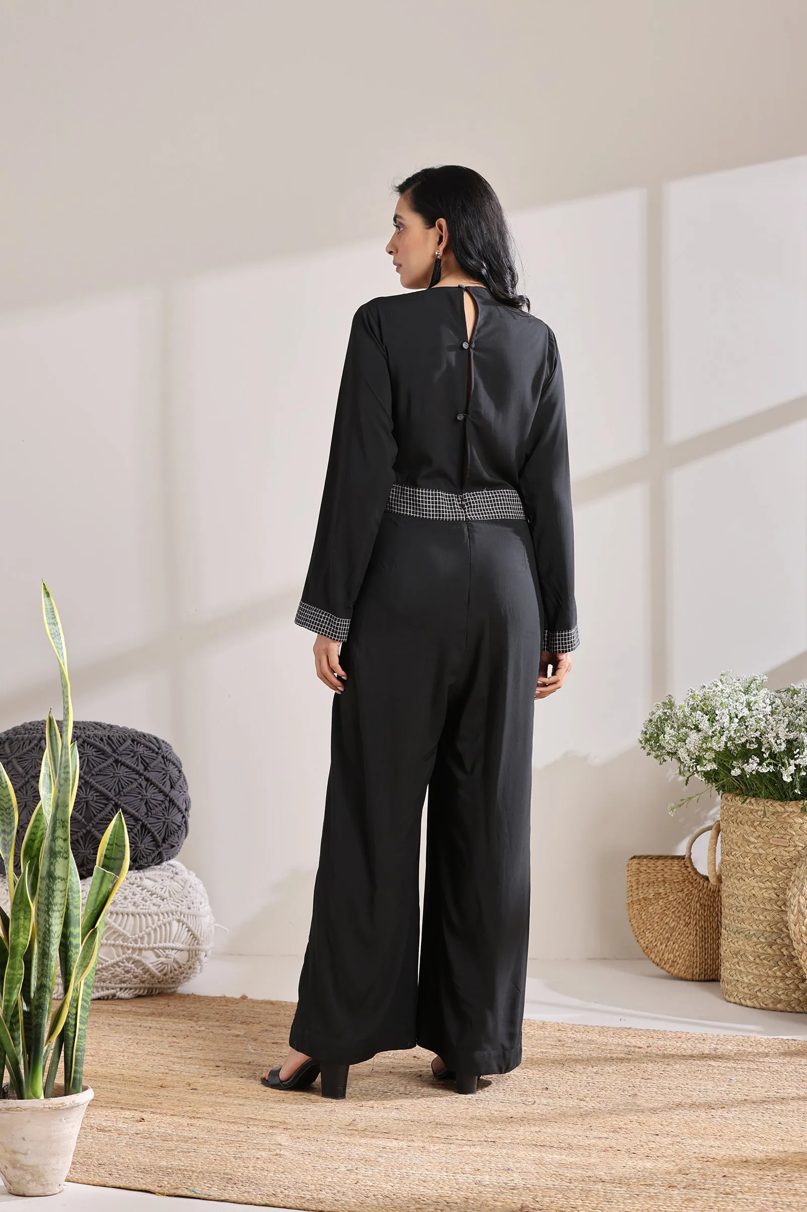 BELTED CHECK JUMPSUIT
