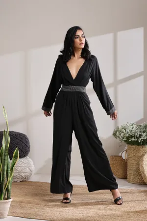 BELTED CHECK JUMPSUIT