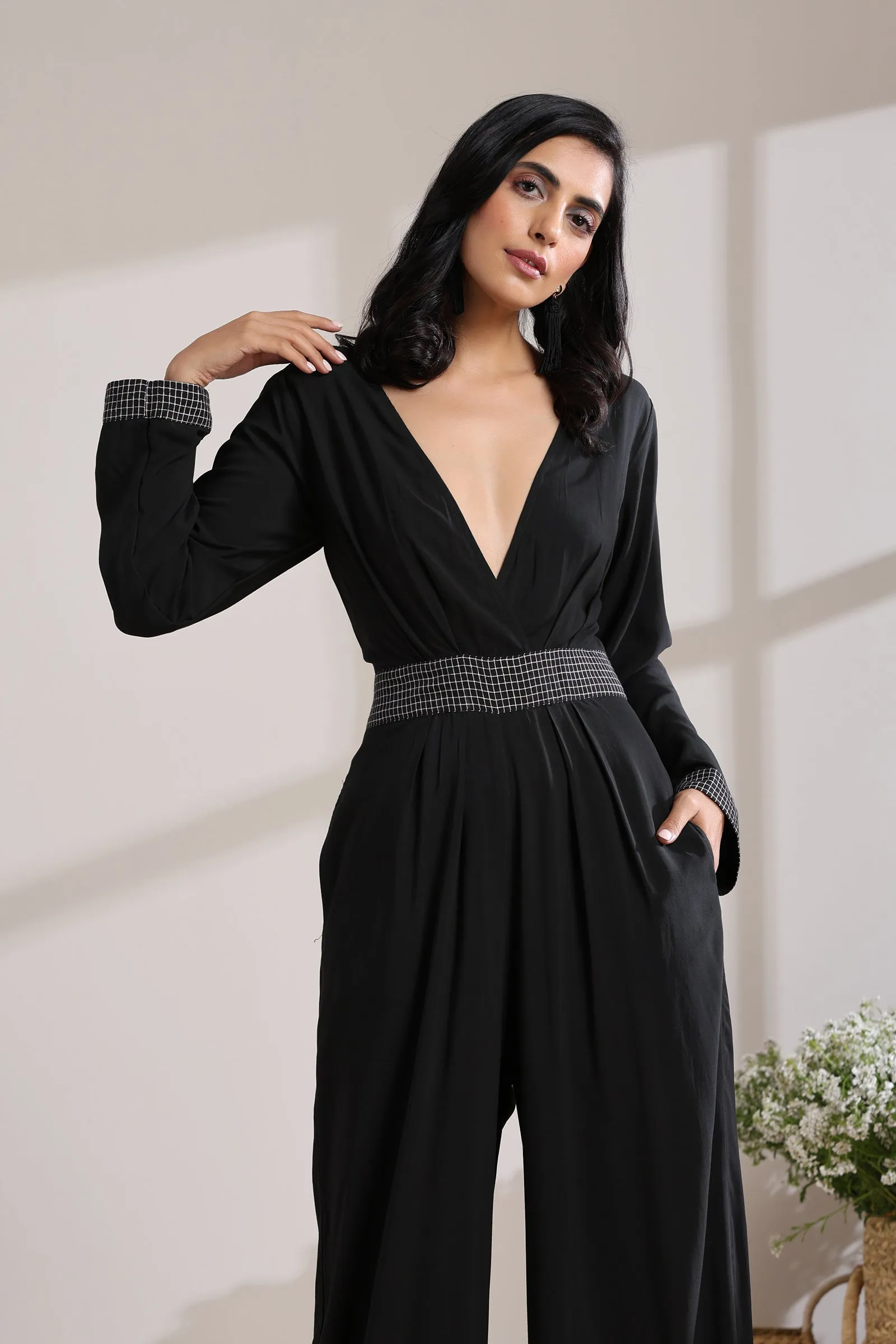 BELTED CHECK JUMPSUIT